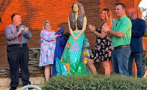 unveiling a statue on the Mermaid Tale Trail at Weeki Wachee Springs State Park